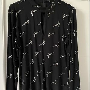 Guess Brand New - peek a boo top . Never worn .